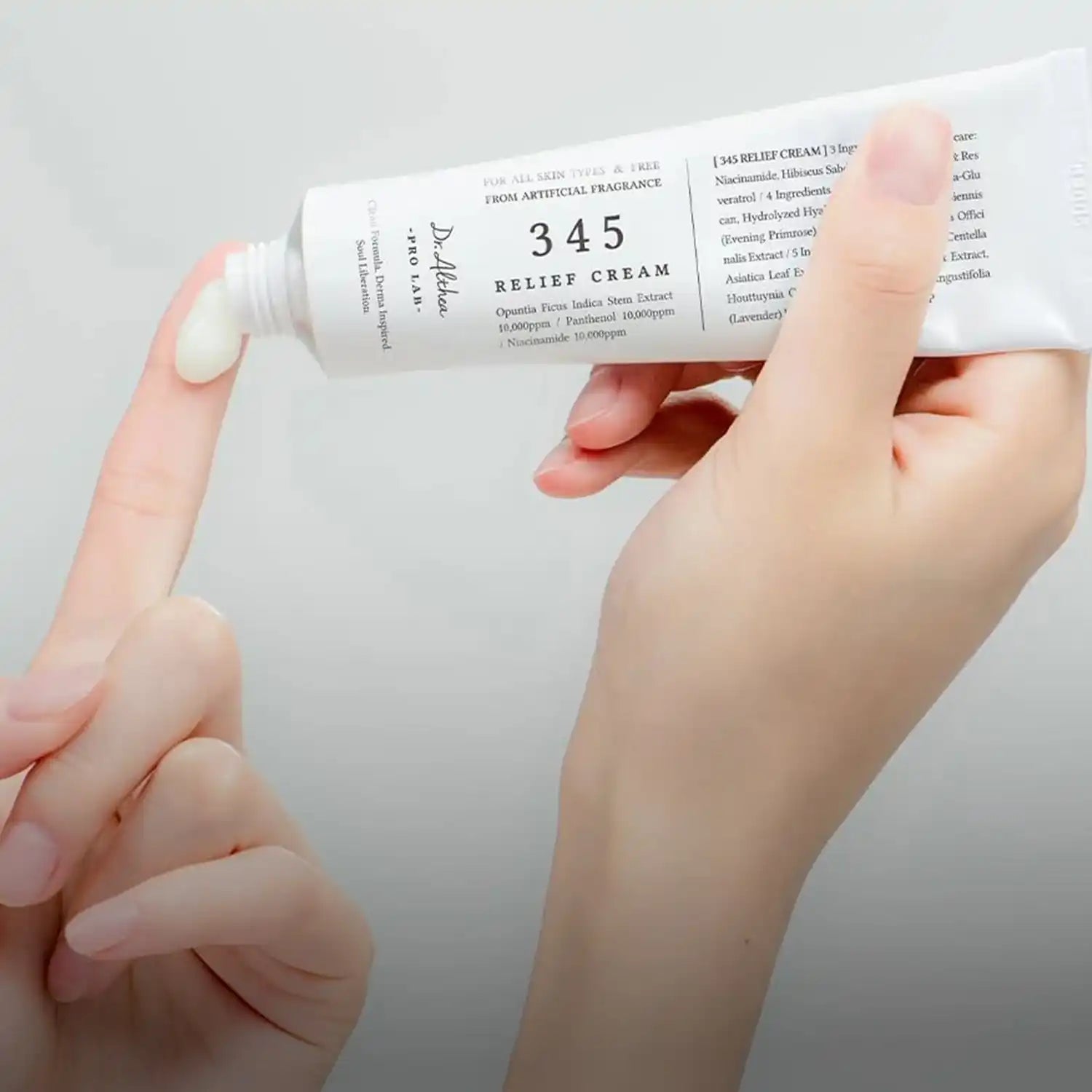 345 relief cream tube with white label and cream-colored contents.