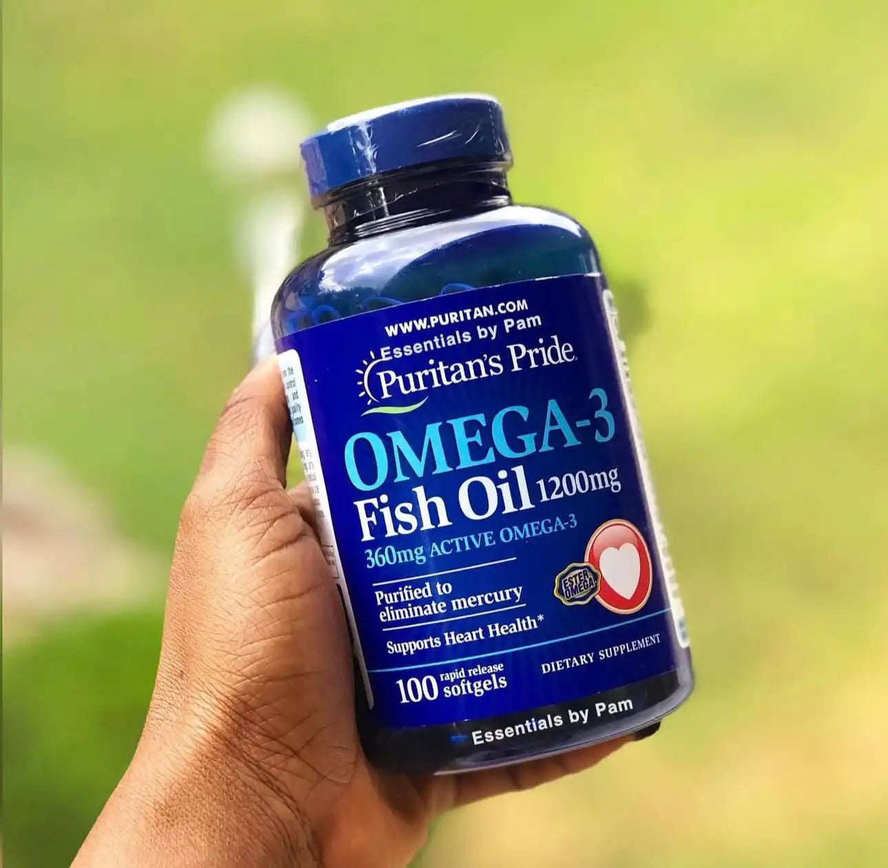 A bottle of Puritan’s Pride Omega-3 Fish Oil 1200mg softgels.