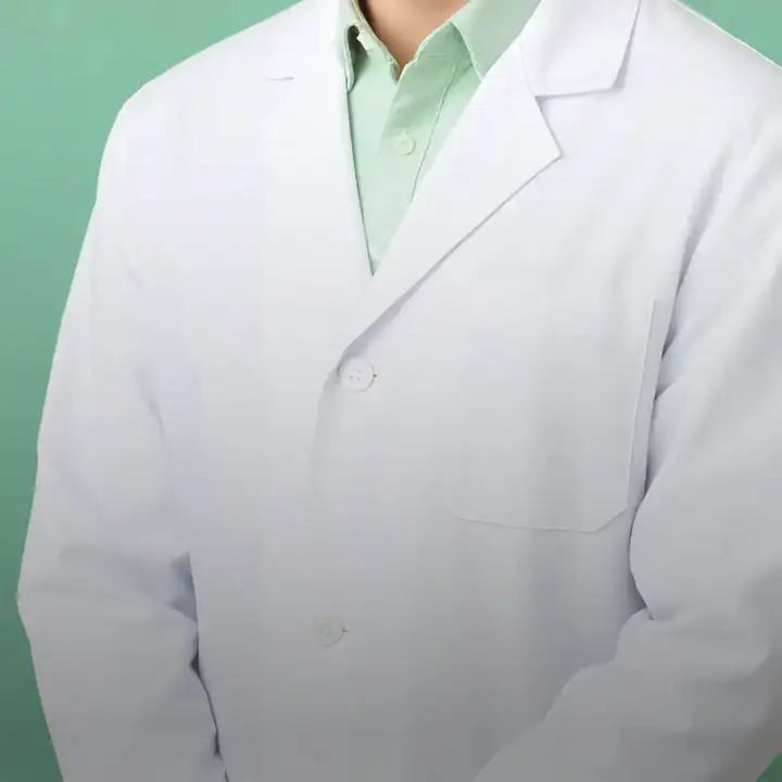 White lab coat with a classic collar and button closures, worn over a light green shirt.