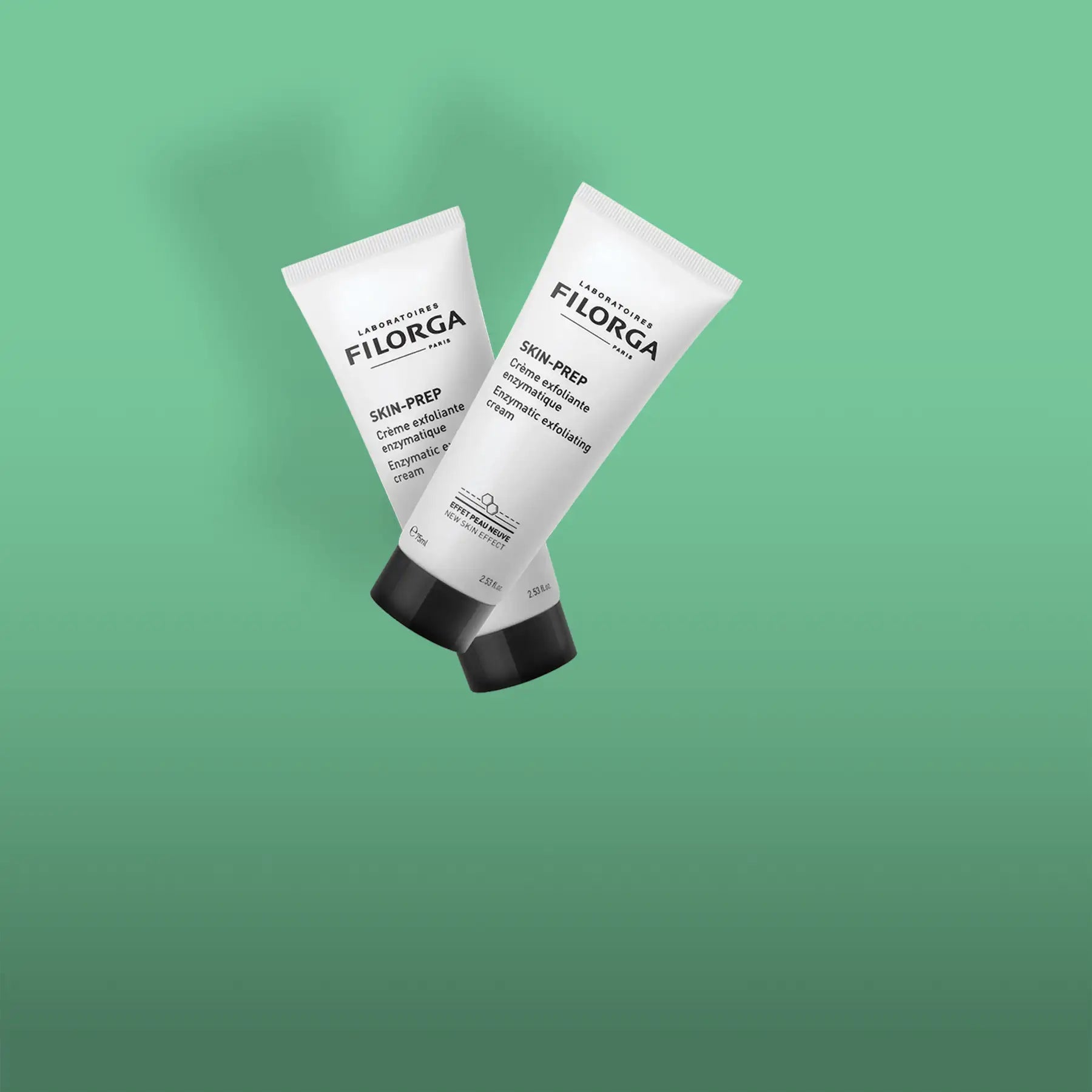 Two white filorga skin-prep enzymatic exfoliating cream tubes with black caps, featuring minimalist branding and a sleek design.