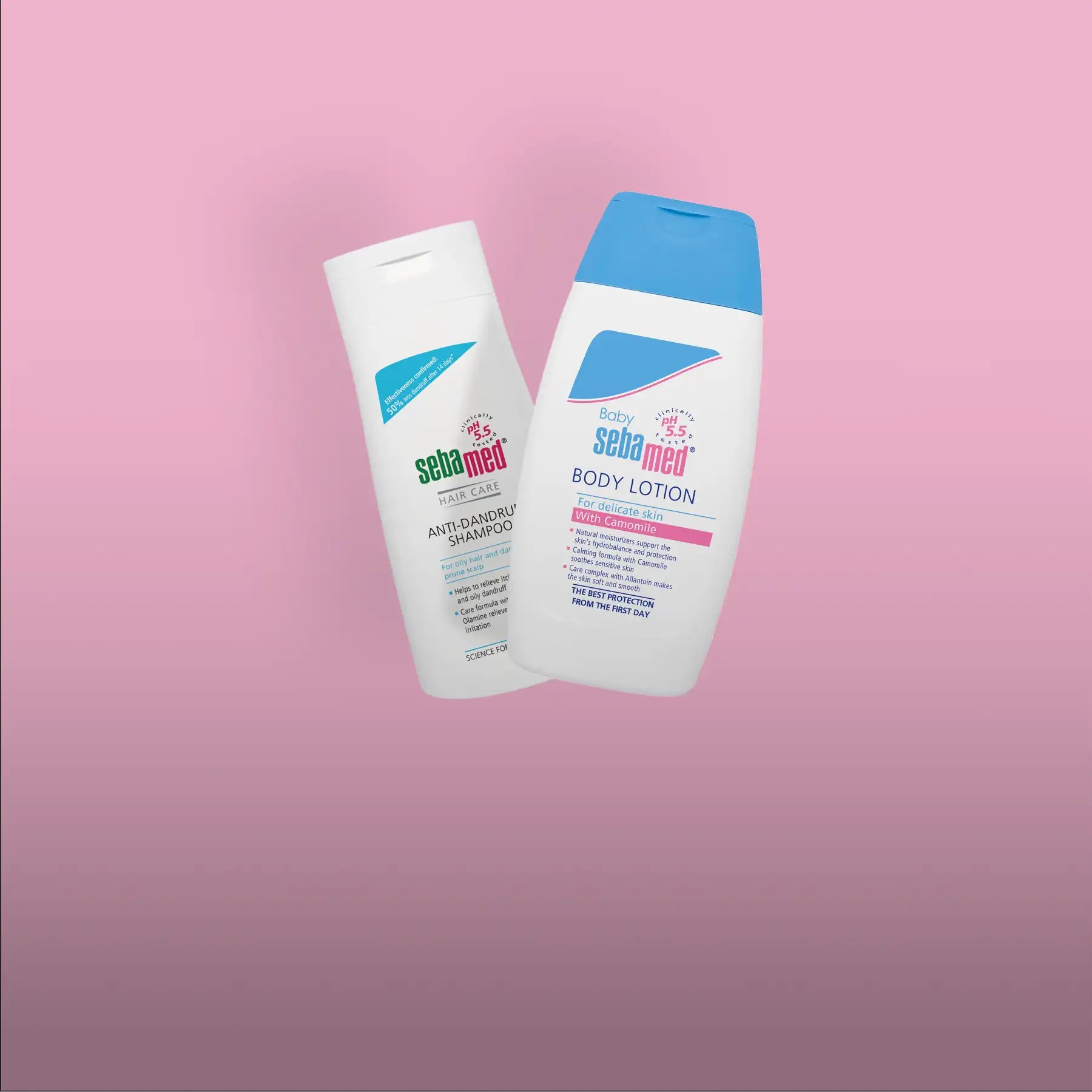 White plastic bottles with blue caps and labels, one labeled ’baby sebamed anti-dandruff shampoo’ and the other ’sebamed body lotion,’ featuring a clean design typical of baby care products.