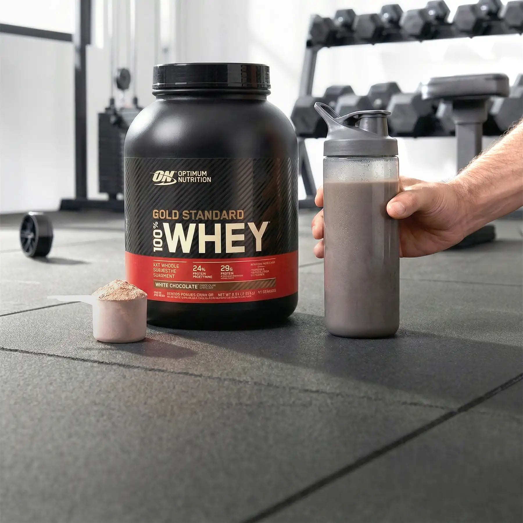 Black container of optimum nutrition gold standard 100% whey protein powder in white chocolate flavor.