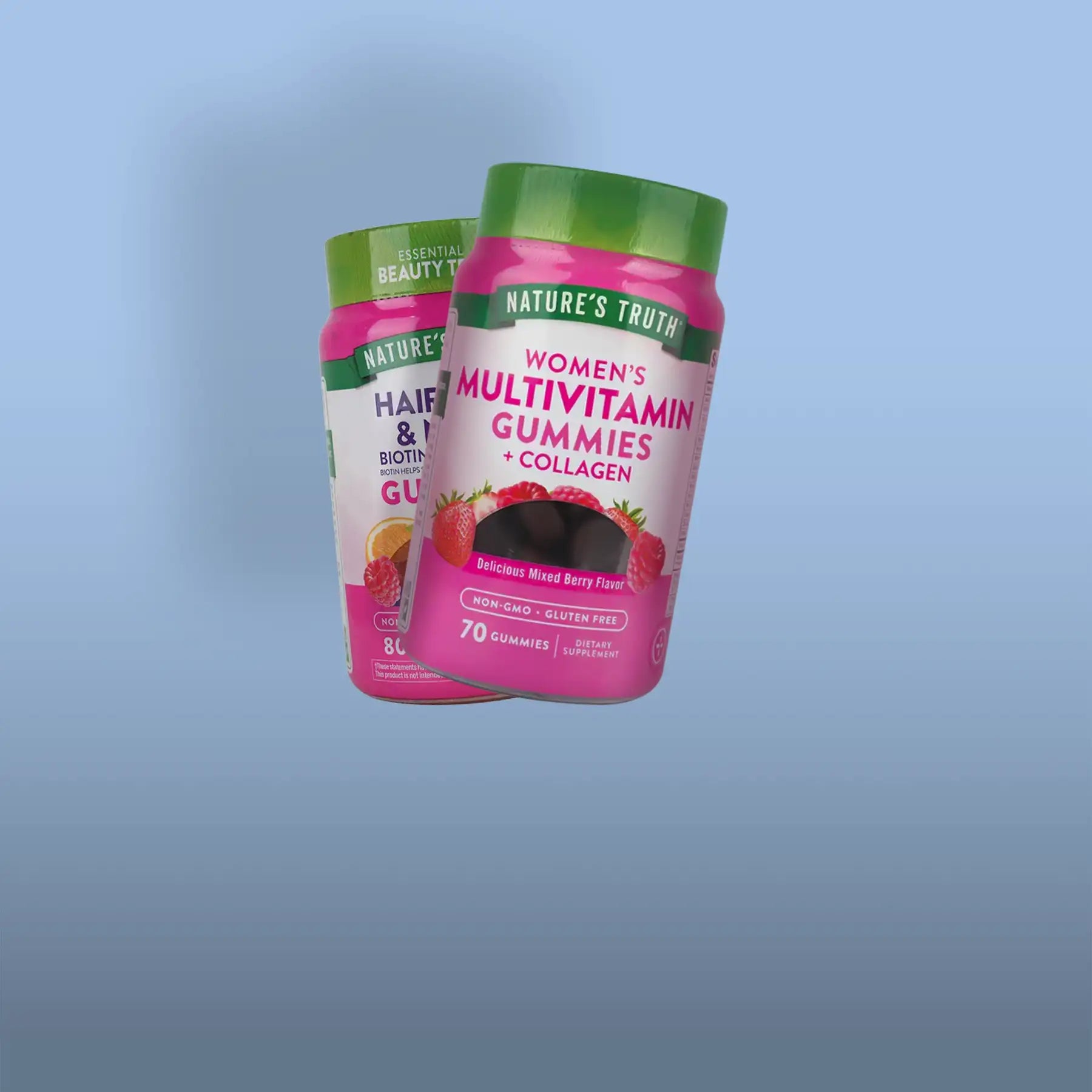 Pink plastic bottle with green cap containing nature’s truth women’s multivitamin gummies plus collagen in mixed berry flavor.