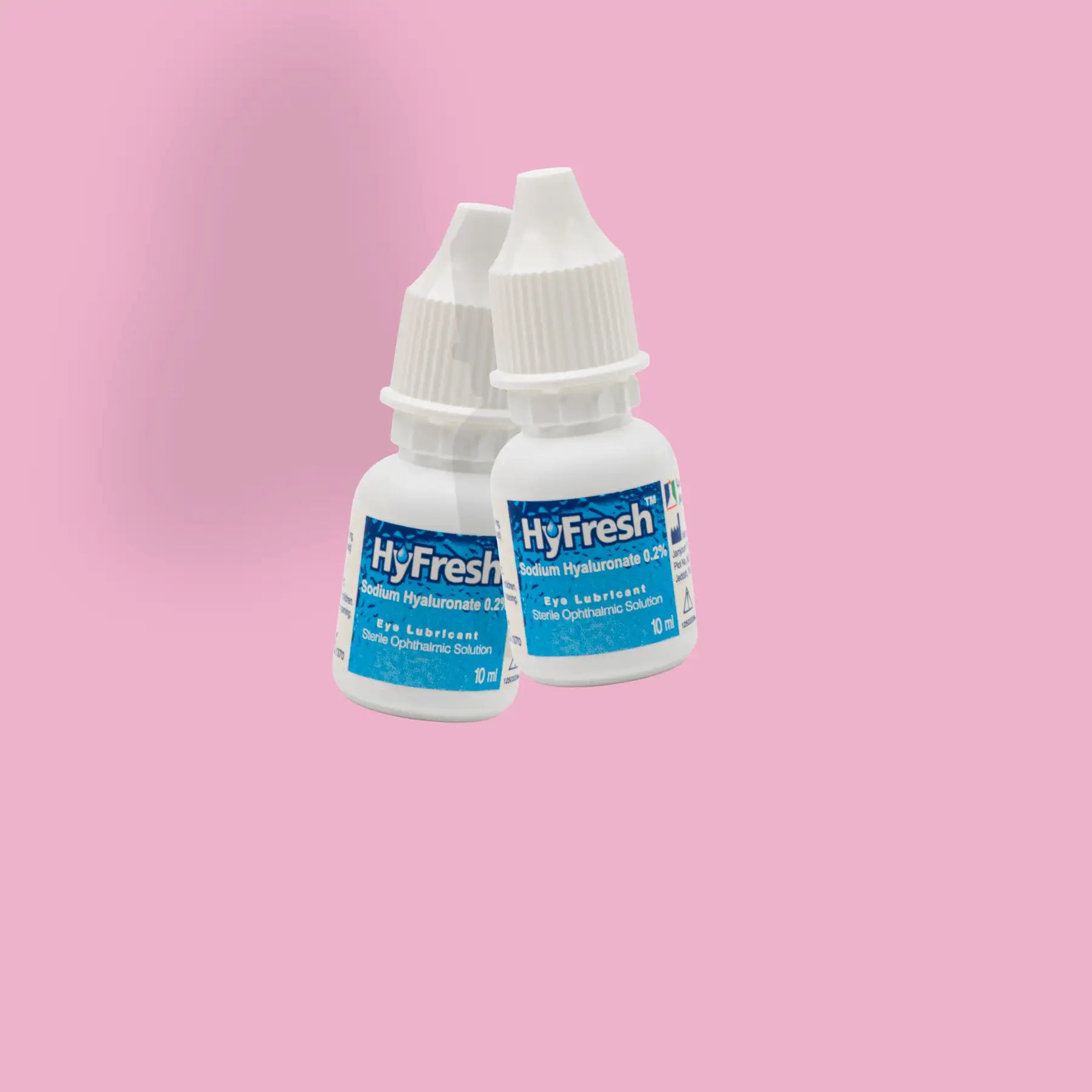 Two white plastic bottles of hyfresh eye lubricant with blue labels and dropper caps.