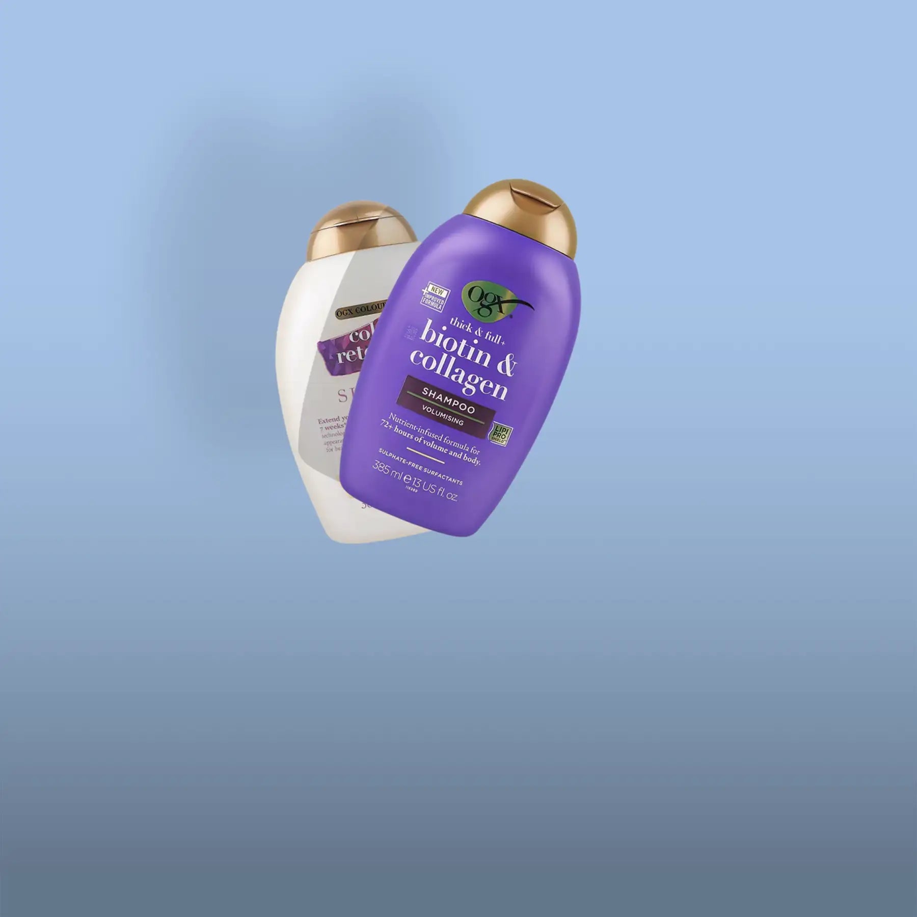 Purple ogx biotin & collagen volumizing shampoo bottle with a gold cap.