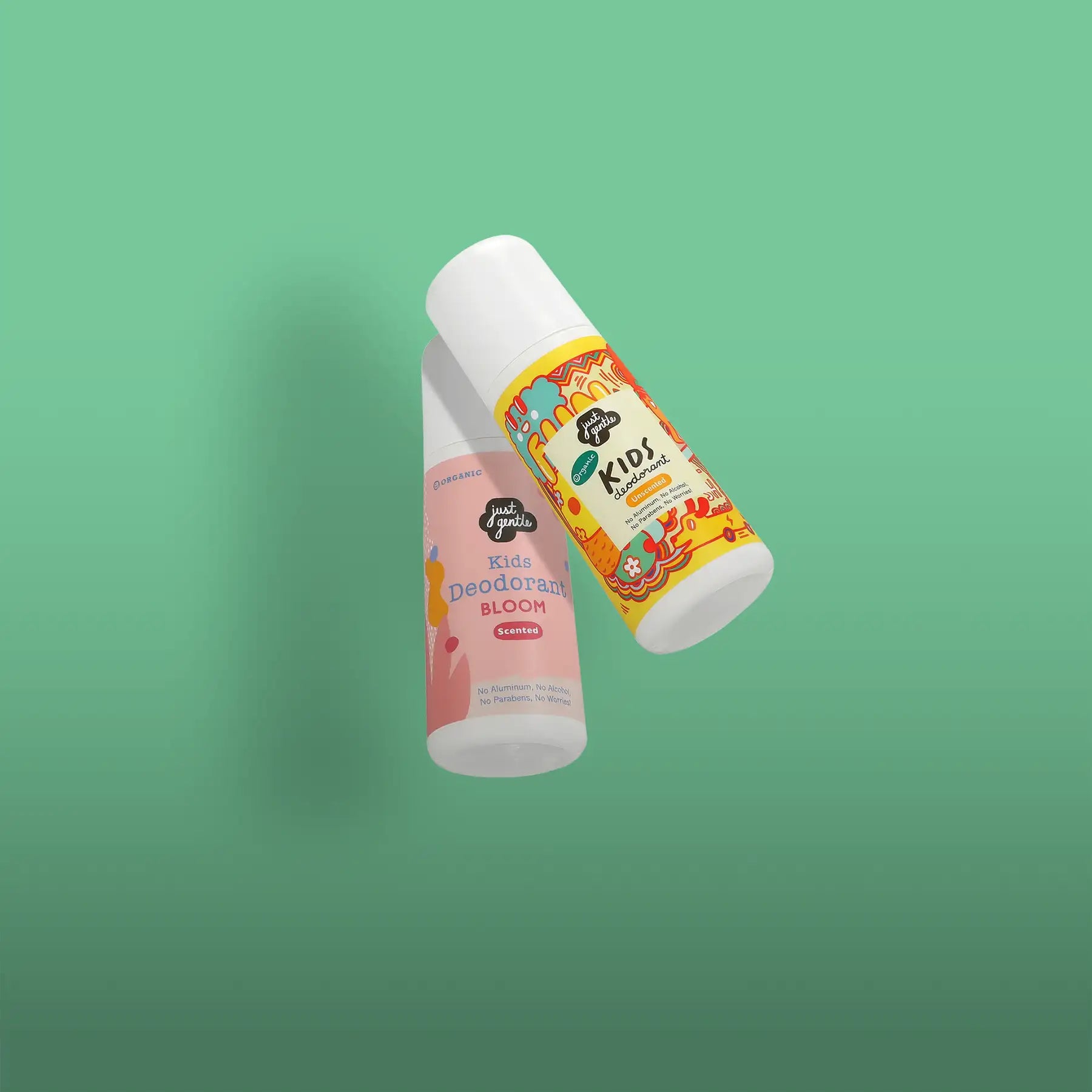 Two children’s deodorant roll-ons, one in pink with a floral design and the other in yellow with an illustrated pattern.