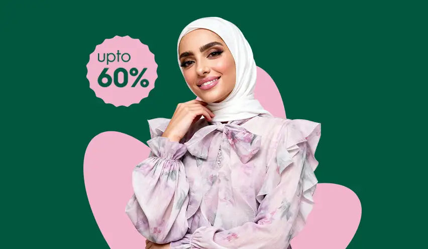 Lavender floral blouse with ruffled sleeves and hijab.