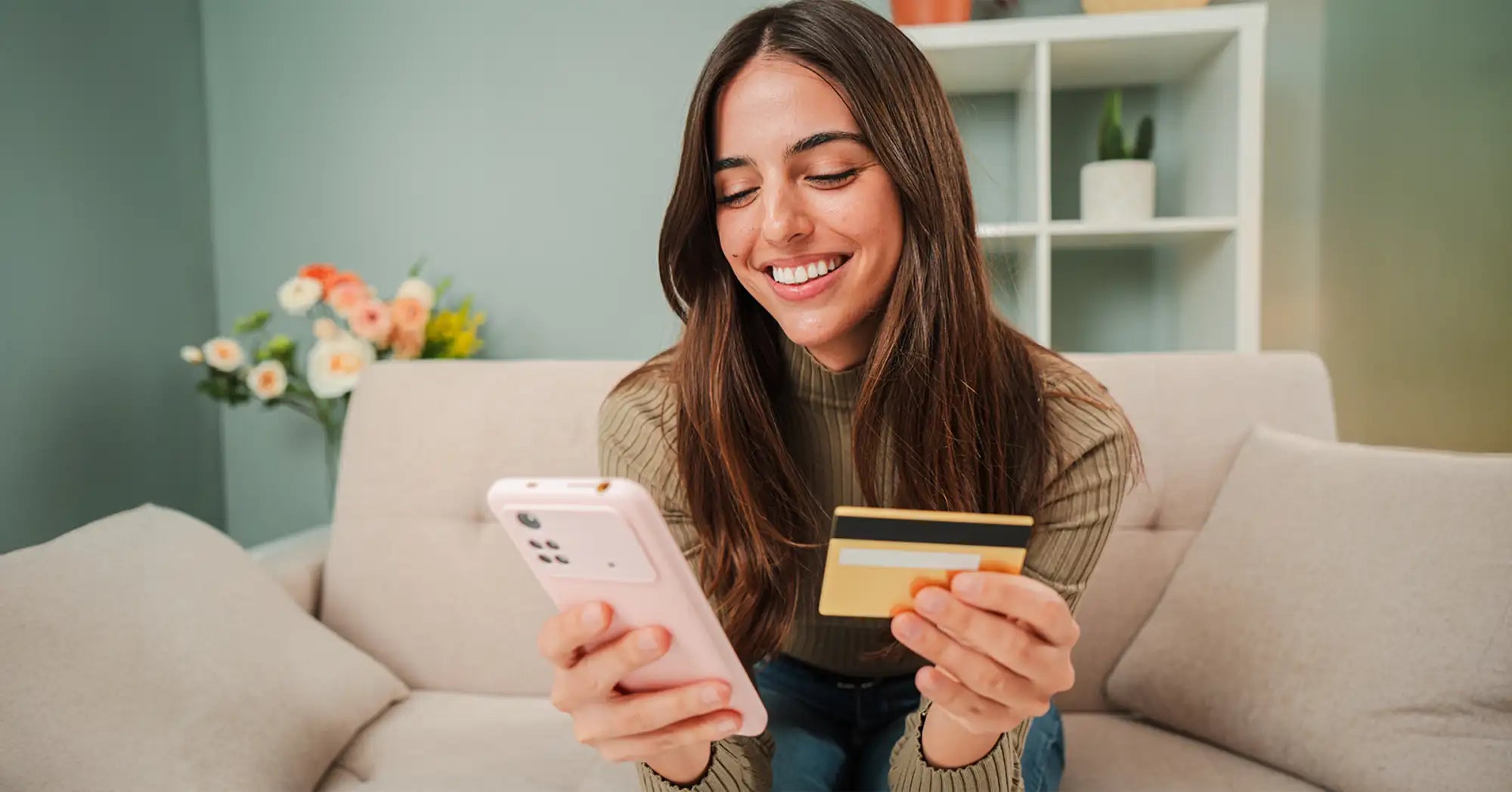 White iphone 12 with gold cardholder accessory
